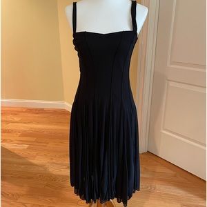 Cute black dress fully lined worn once. The dress is a size medium.